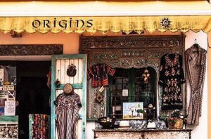 Origins Gallery featuring a hippy, bohemian store front
